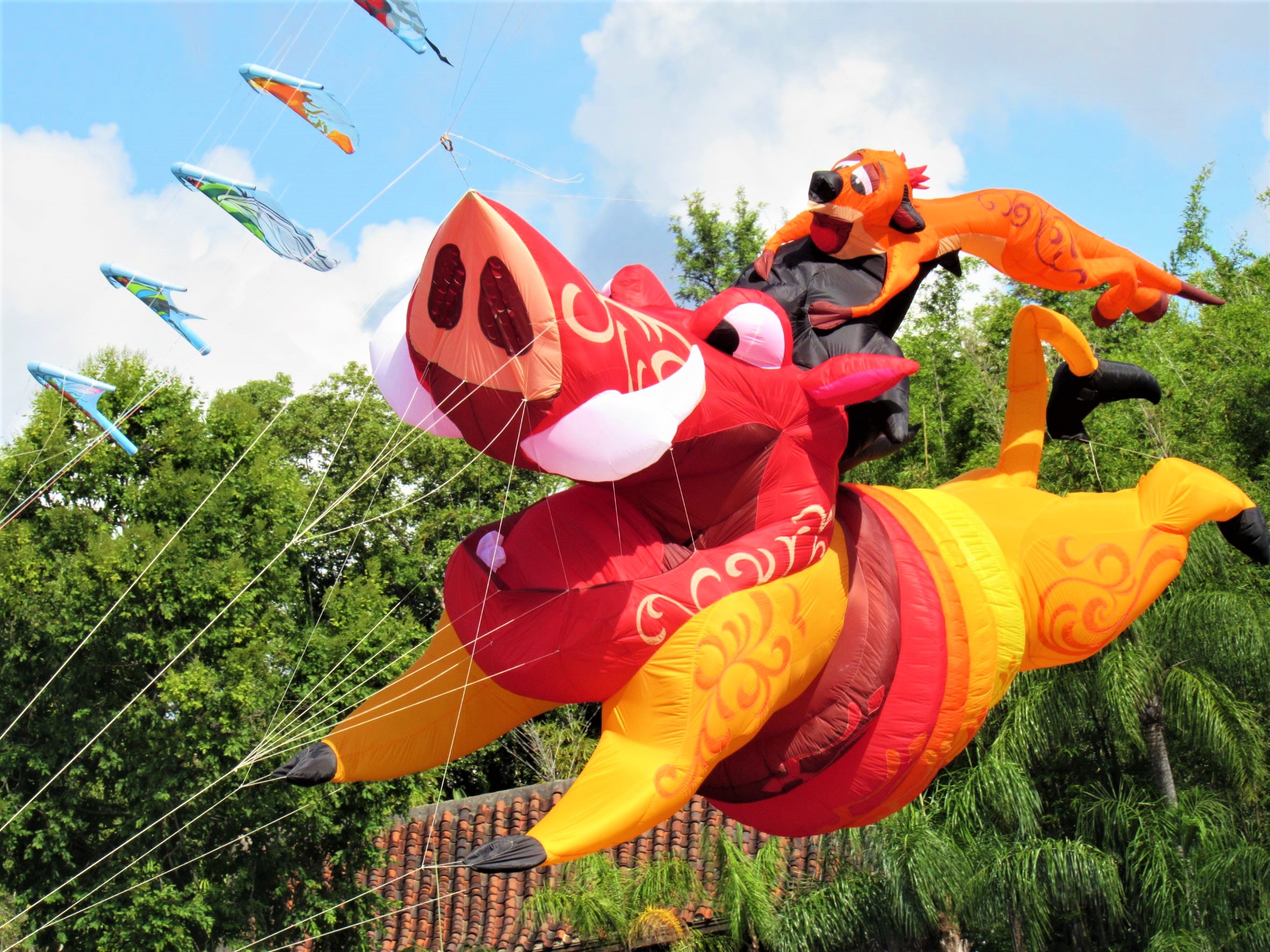 Timon and Pumbaa Take Flight Over Disney's Animal Kingdom in Disney  KiteTails – Ink and Paint in the Parks