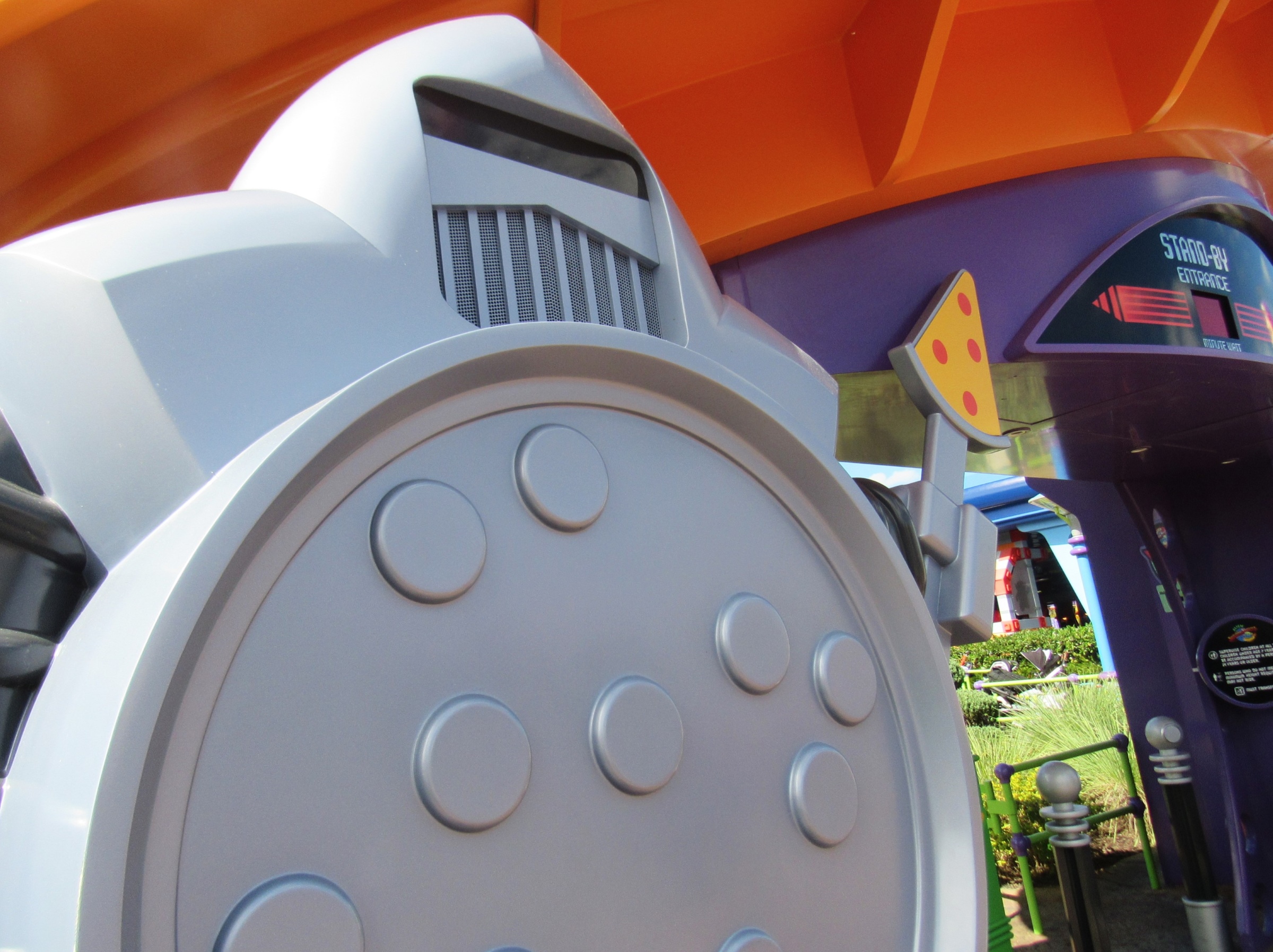 Pizza Planet's Robot Guards Stand Watch at the Entrance to Alien Swirling  Saucers at Disney's Hollywood Studios – Ink and Paint in the Parks